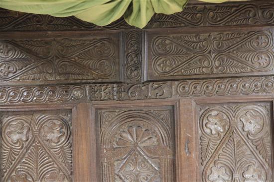 A 17th century carved oak tester bed, W.4ft 6in. H.6ft 1in. L.7ft 2in.